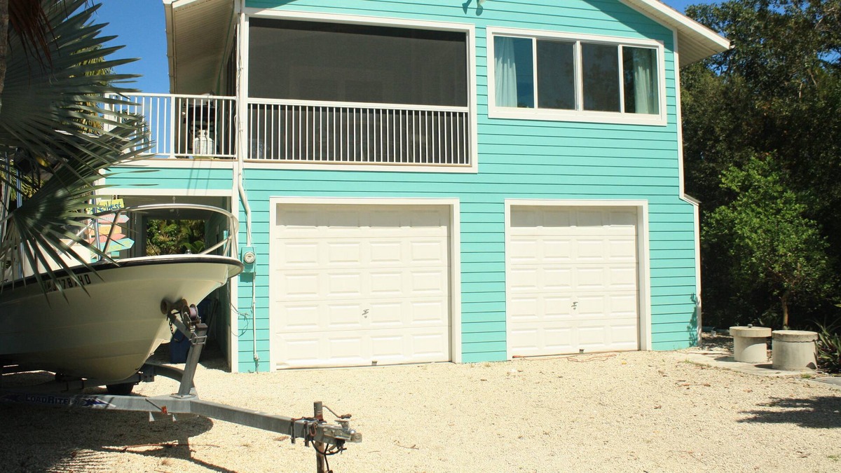 Breezeswept Beach Estates House | Beautiful 3 bedroom 2 bath canal front home with excellent boating!!