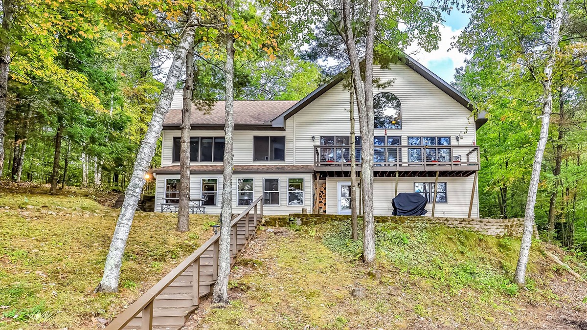 Lac du Flambeau House | Beautiful and quiet lake home w/air hockey, foosball, firepit, WiFi, central AC
