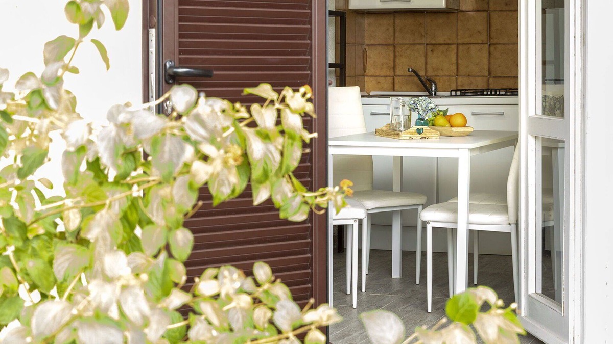 Golfo Aranci Apartment | Beautiful apartment for 4 guests with A/C, pool, TV, terrace, pets allowed and parking