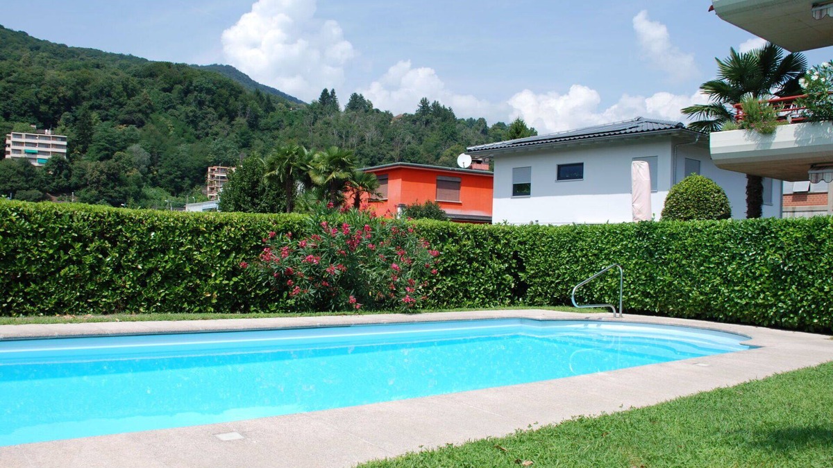 Caslano Apartment | Beautiful apartment for 4 guests with pool, WIFI, TV, patio and pets allowed