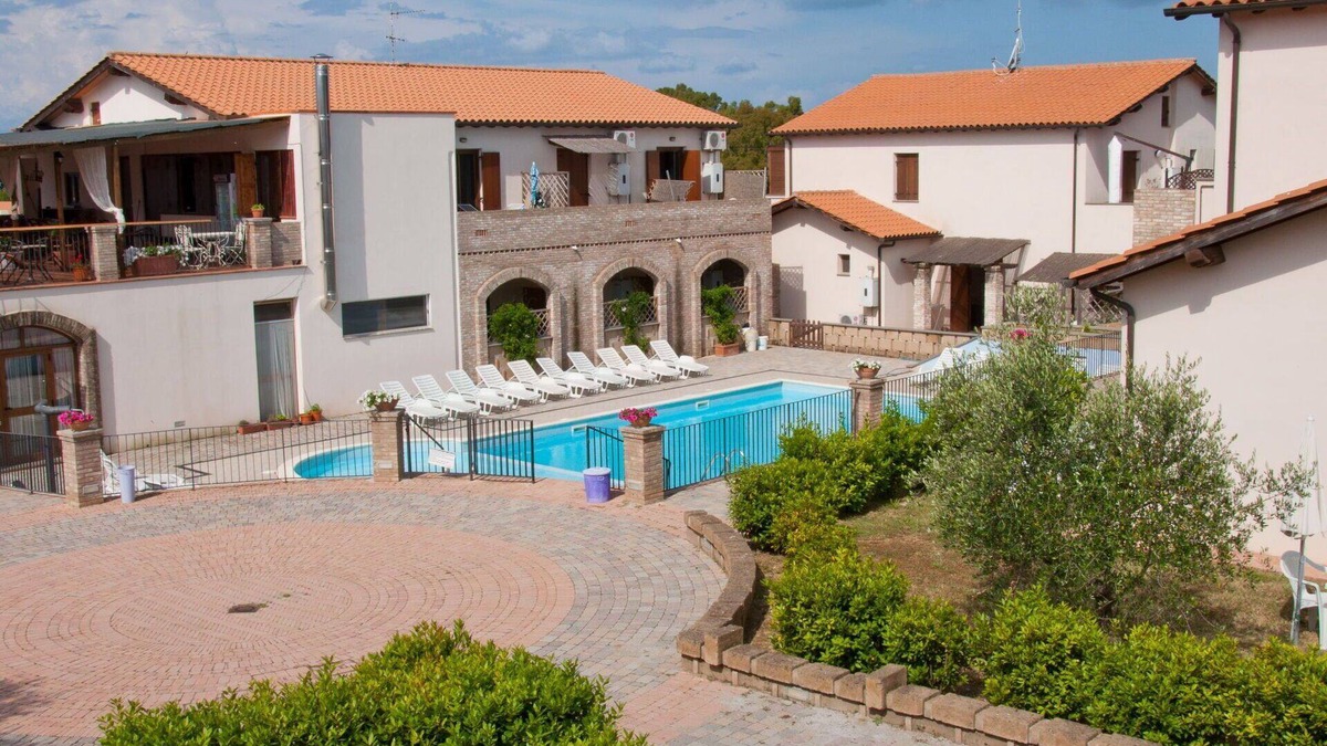 Follonica Apartment | Beautiful apartment for 6 guests with pool, A/C, TV, patio and pets allowed