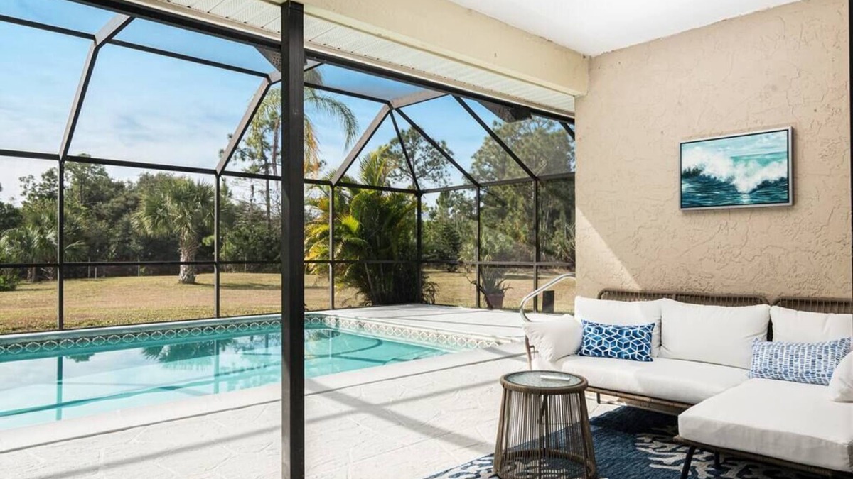 Rural Estates Villa | Beautiful Canal Front Home with Pool, Tennis Court