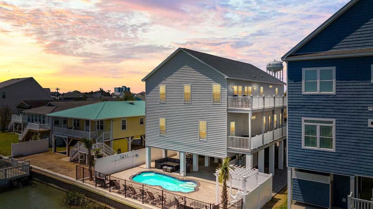 Cherry Grove Beach House | Beautiful Channel Retreat- Private Pool, Luxury Outdoor Living and Pet Friendly