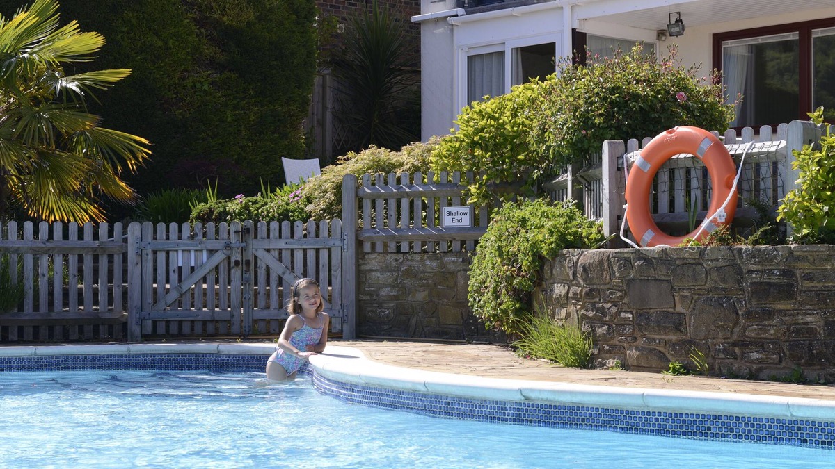 Eastbourne House | Beautiful family house with pool and views over golf course and South Downs