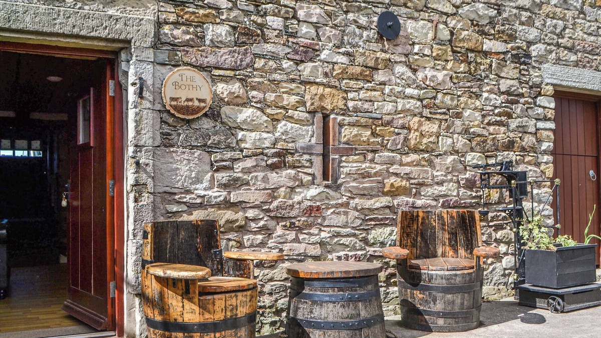 Maryport Cottage | Beautiful features with exposed stonework and beams.