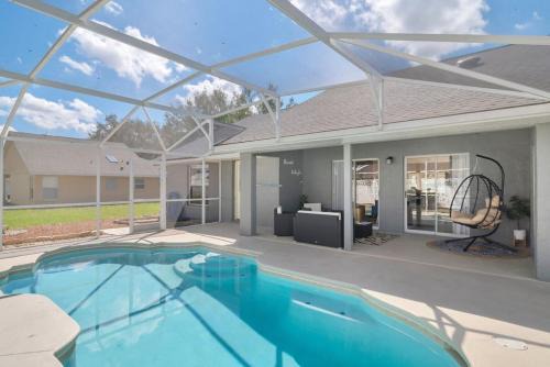 Briargrove House | Beautiful Home Near Disney with Heated Pool and Game Room