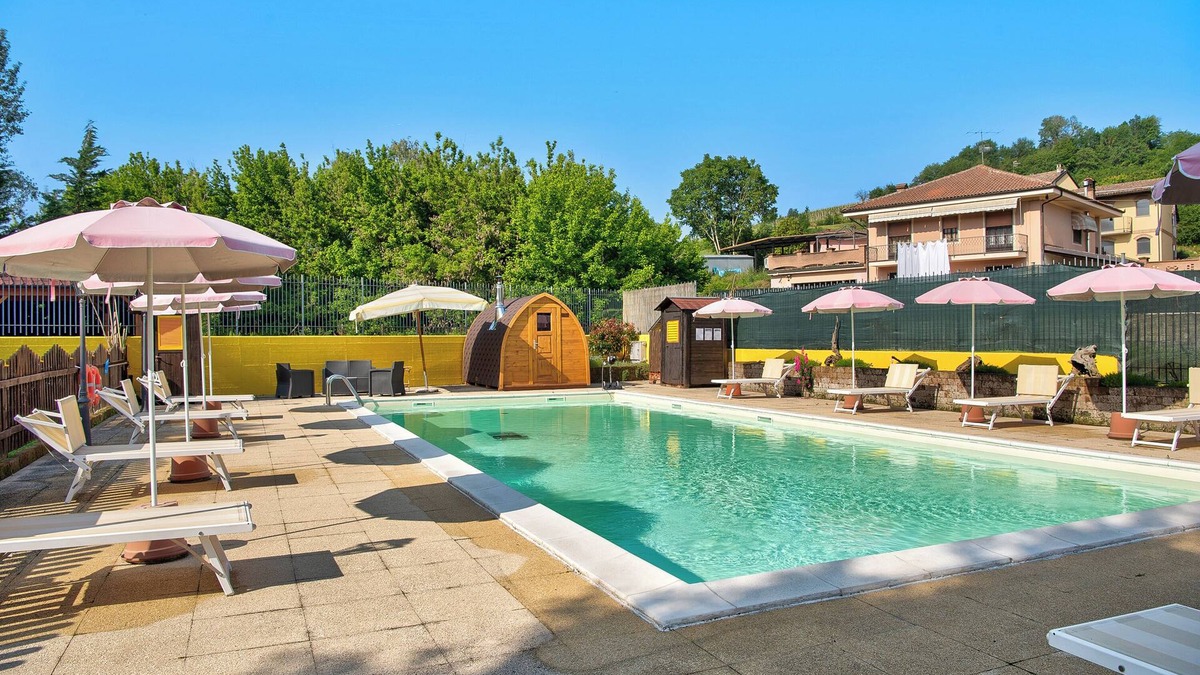 San Matteo Apartment | Beautiful "Iris Apartment," in Piedmont, with shared pool, garden and sauna