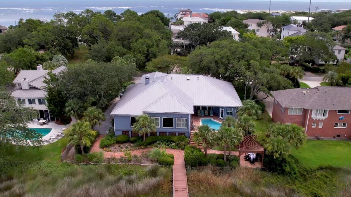 East Beach House | Beautiful Large Home with Pool, Riverfront Dock, Gourmet Kitchen and Kids' Bunk Room.