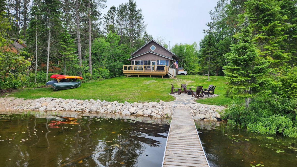 Gould City Cottage | Beautiful Lake House With Outdoor Firepit and Great Fishing!