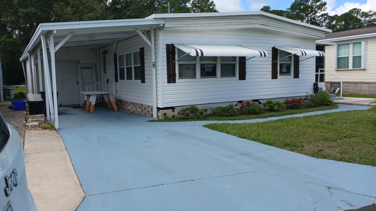 New Smyrna Beach Cottage | Beautiful modular home in scenic river complex.