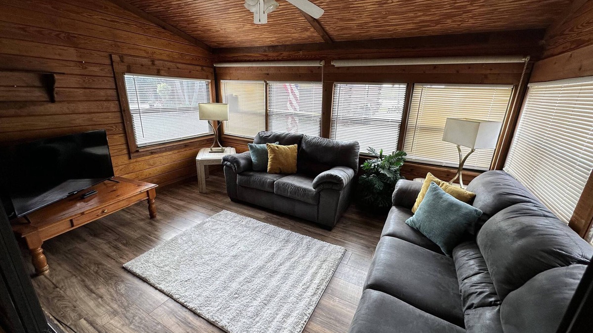 Okeechobee Cabin | Beautiful private log cabin on the water in a small cabin community.