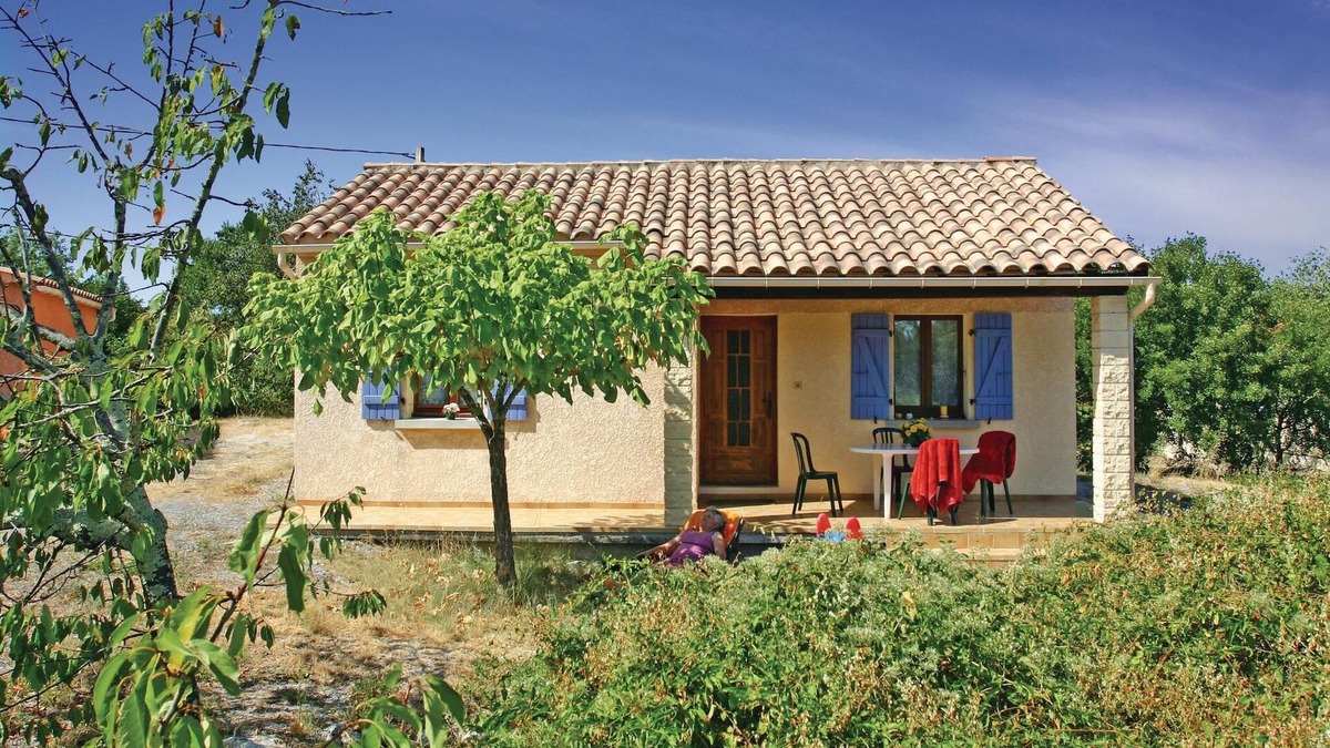 Labeaume House | Beautiful Provencal style house with exposed wooden beams and open terrace.