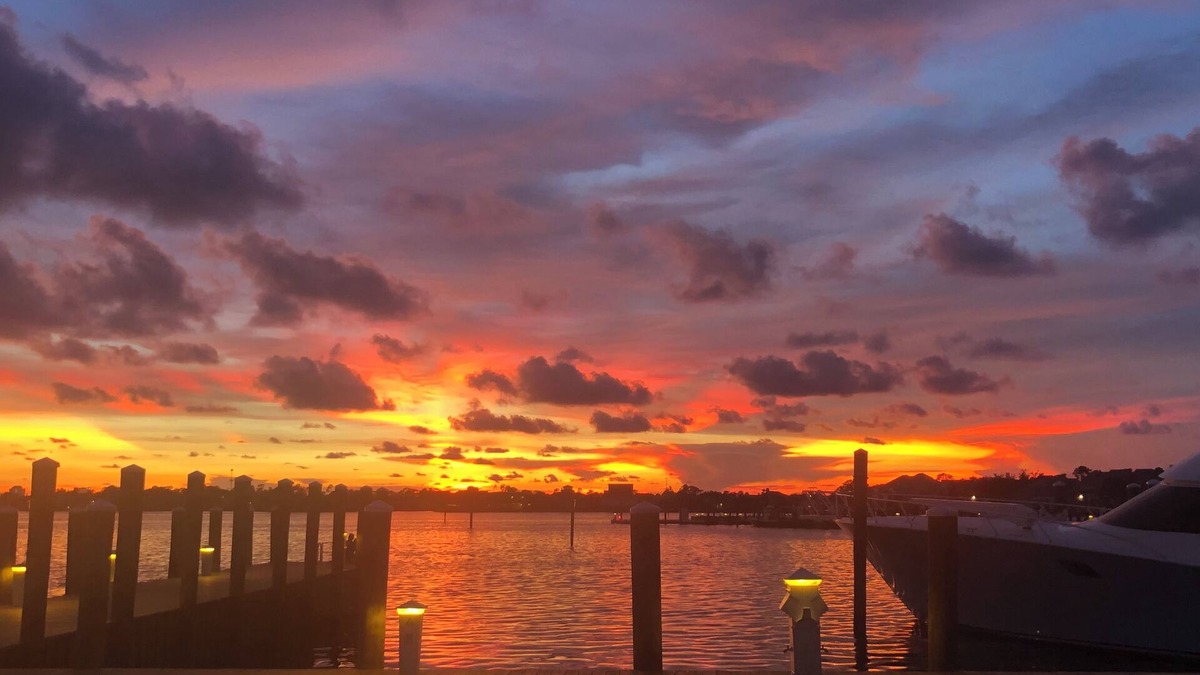 Upper Grand Lagoon Villa | Beautiful sunset waterfront 1st floor marina villa. Quiet safe gated community.