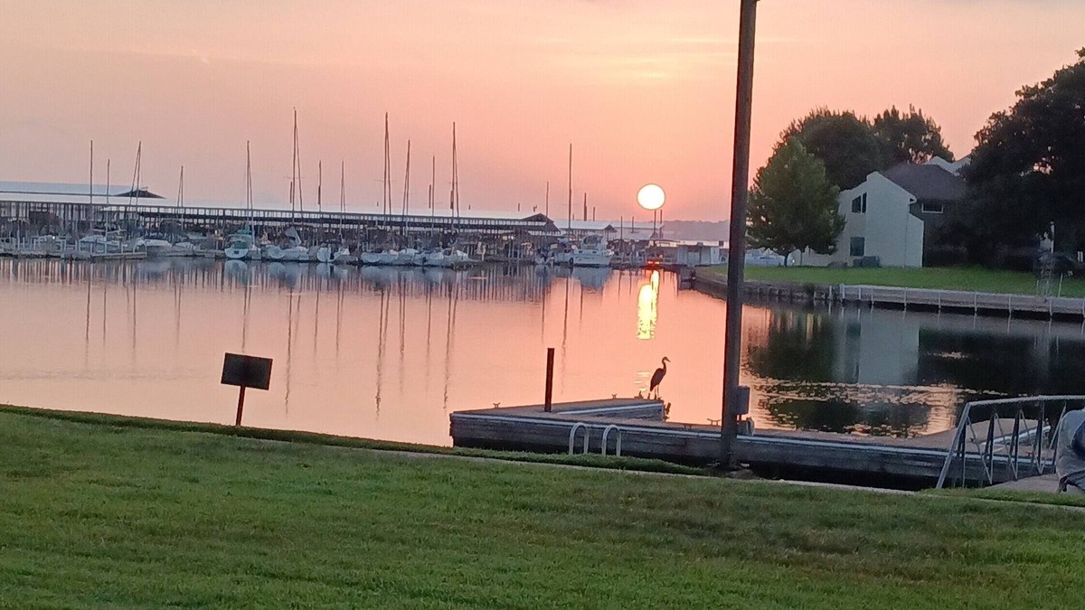 Walden on Lake Conroe Apartment | Beautiful sunrises waterfront condo with boat docking on backyard