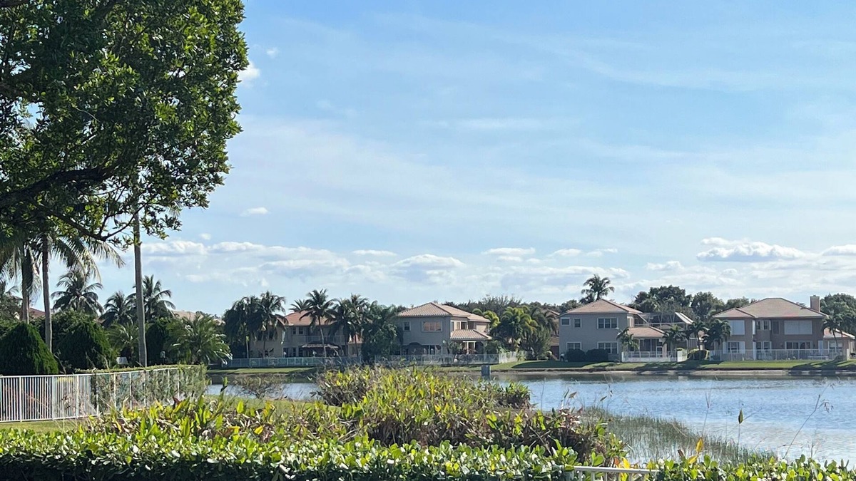 Lake Worth House | Beautiful two story Spacious 5-bedroom house with water views and pool & gym