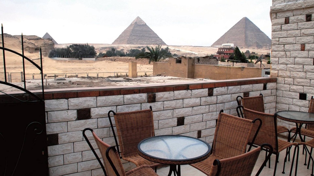 Kafrat al Jabal Apartment | Beautiful view of the Pyramids, with air conditioning, WiFi, and touristic guide