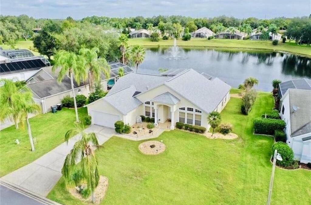 Sunridge Woods House | Beautiful Waterfront Home with Heated Pool and Game Room