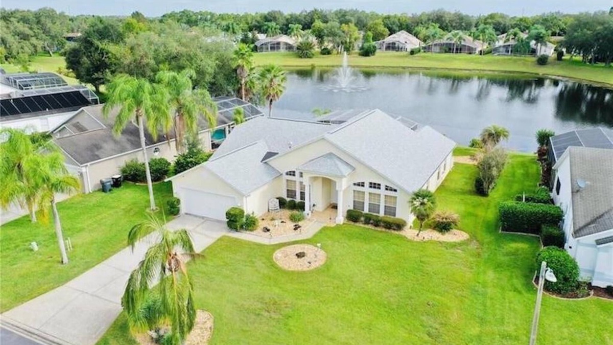 Sunridge Woods House | Beautiful waterfront home with heated pool and game room.
