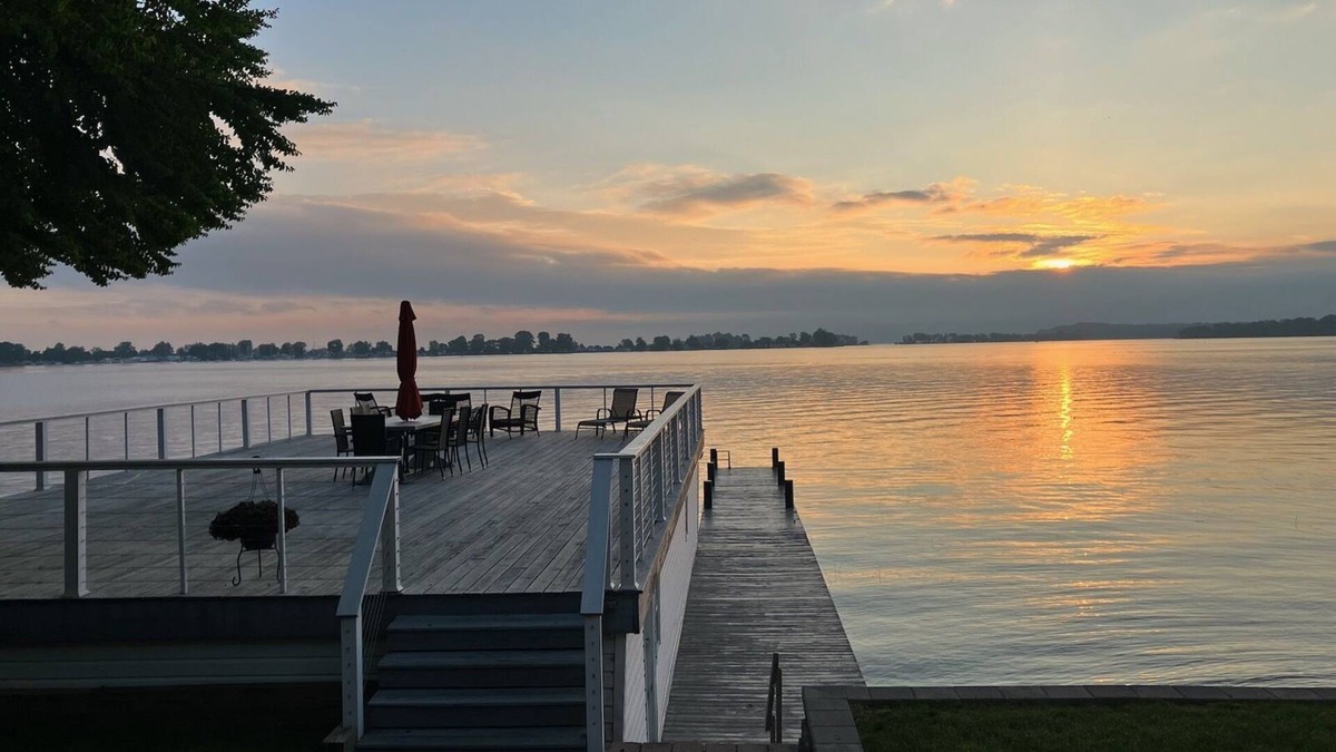 Sodus Point House | Beautifully updated home on the bay and golf course with dock and raised deck!
