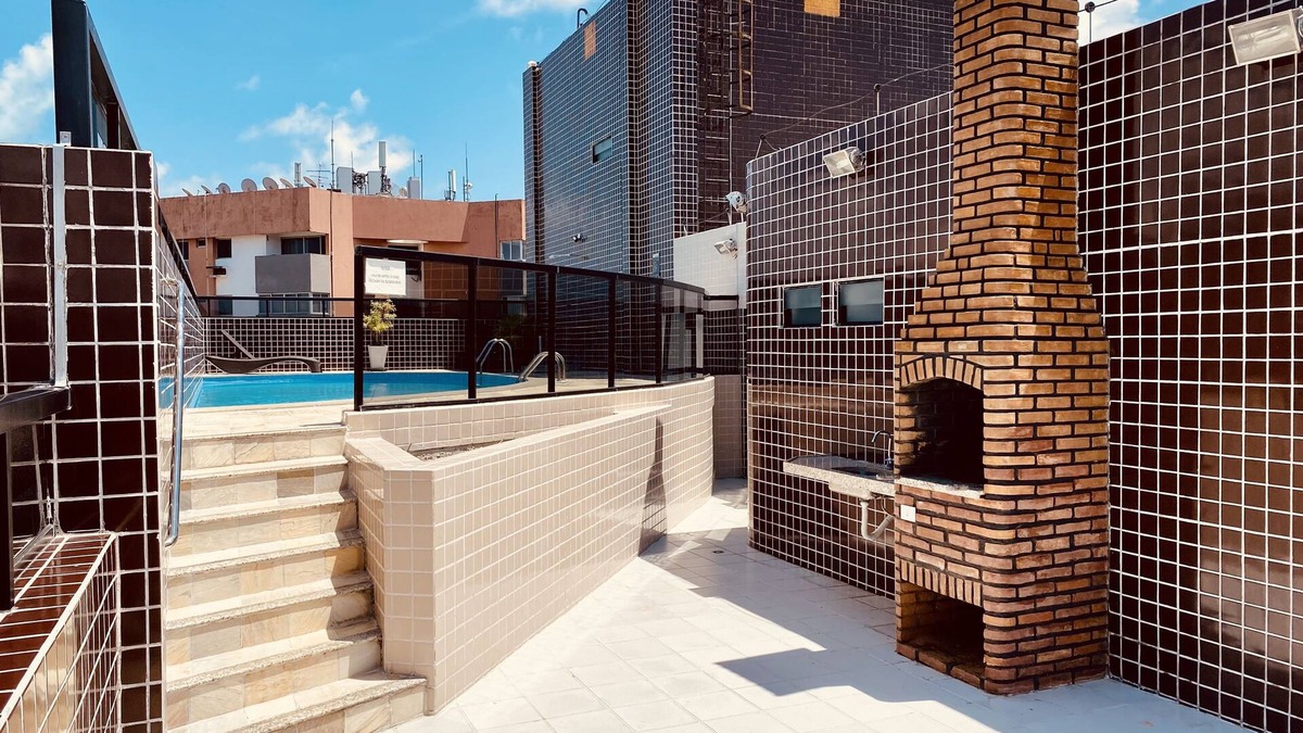 Ponta Verde Apartment | Bedroom and living room with pool near the beach