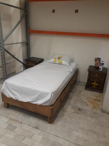 Villa de Guadalupe Apartment | bedroom cuarto compartido y basico planta baja