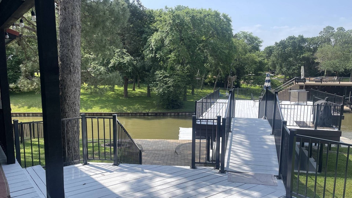 Carolyn Estates House | Belle Maison du Lac! Lakefront Retreat with Boathouse & Firepit - Perfect for Family & Friends!