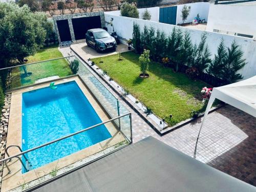 Oulad Azzouz House | Belle villa spacieuse et calme avec piscine à 7min de la plage en voiture