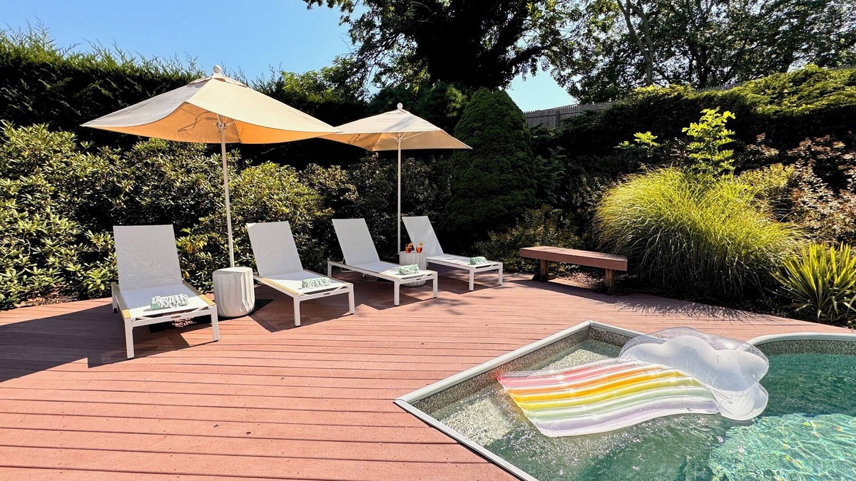 Bellport House | Bellport Bliss: Pool and Relaxing Spaces