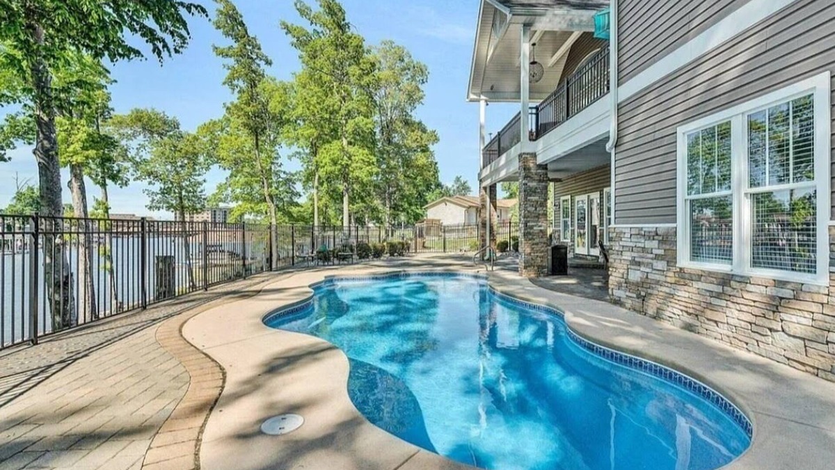 Westlake Corner House | BEST location on Smith Mtn lake! Waterfront home w POOL & Dock in no wake zone.