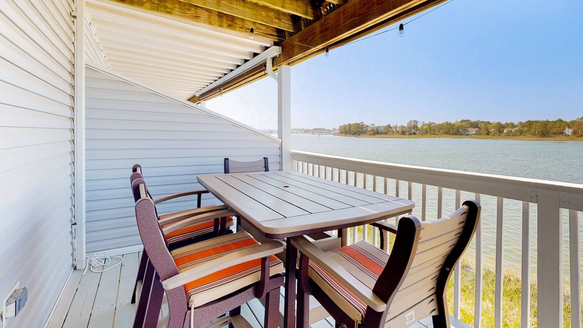 Ocean View Condo | Bethany Marina bayfront condo with pool, fireplace, water views