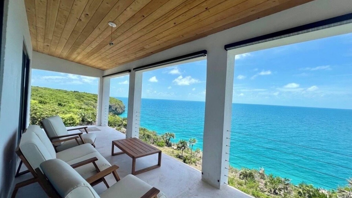 Gregory Town House | Big Pink:nmid-century modern 2bedroom oceanfront home on cliffs of Gregory Town