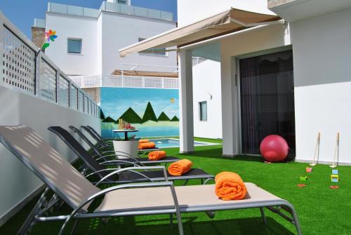 Mogan Villa | Big Villa Tauro with Private Heated Saltwater Pool & Jacuzzi & BBQ & Game Room & Arcade Games