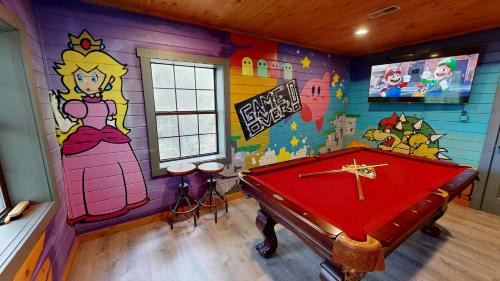 Gatlinburg - Pigeon Forge House | Bigfoot Treehouse - Mountain cabin with arcade, hot tub, and bunkbeds!