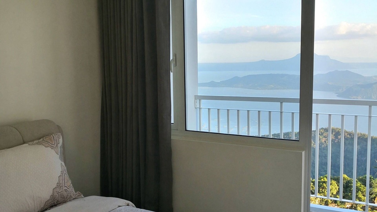 Silang Junction North Apartment | Blowing in the Wind Taal Lake View - 1 Bedroom Corner Apartment with Balcony
