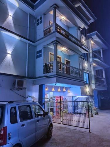 Mulgao Hotel | Blue building Service Apartments and kitchen Facility