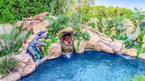 Indio House | Bomb Dot Com with Dinosaur Waterslide