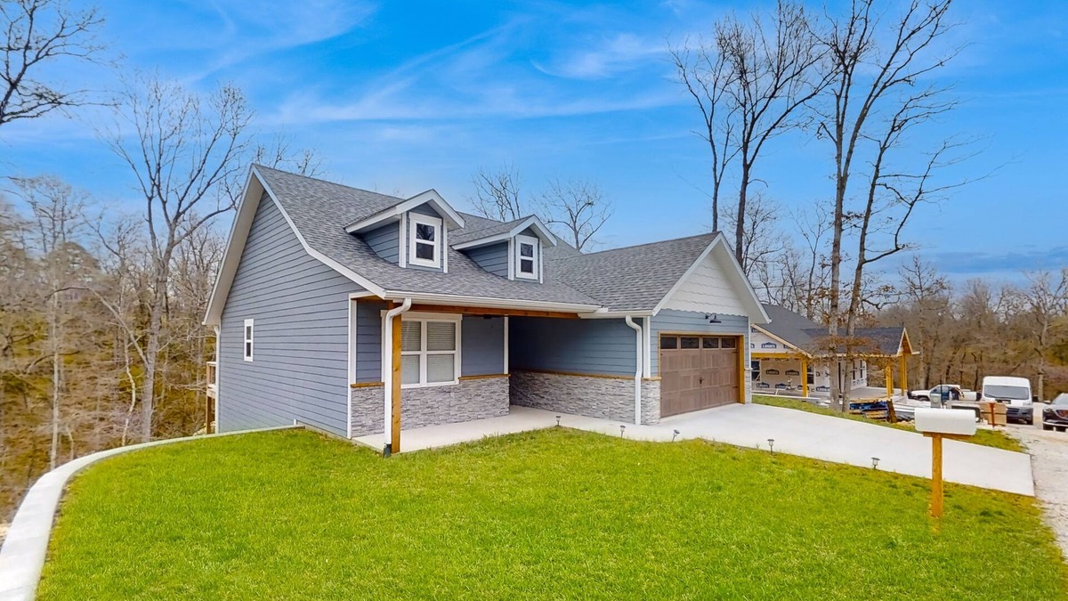 Anderson House | Brand-new, dog-friendly home among the treetops with great deck & location