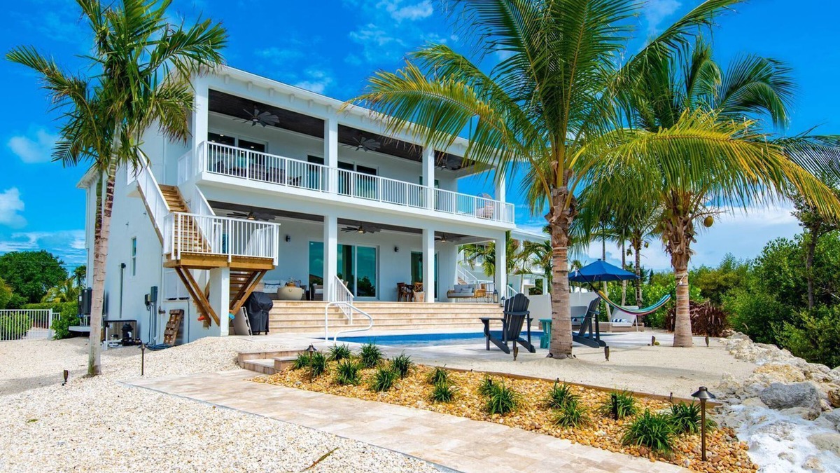 Marathon Villa | Brand New Single Family 5/5 -90ft dock, pool, paddle boards, bicycles plus more!