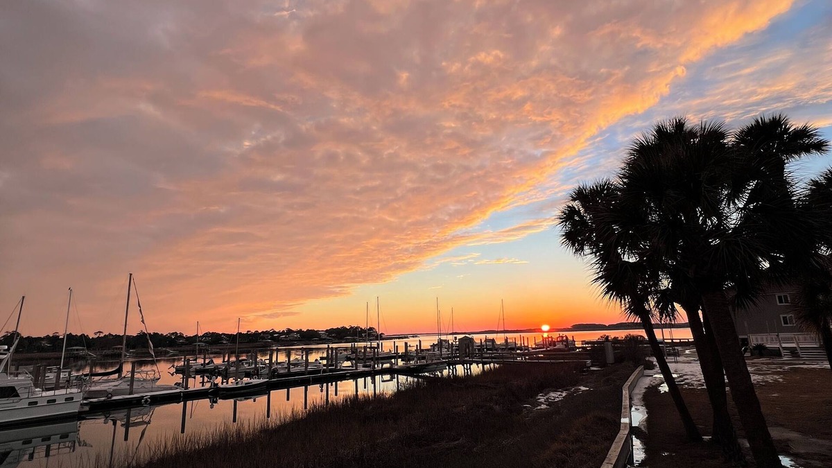 Folly Beach Condo | Breathtaking panoramic waterfront views, 15 minute walk to downtown with pool!