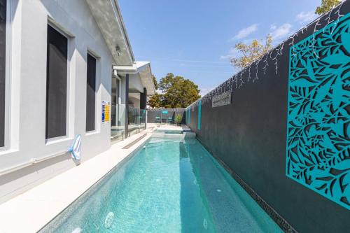 Bongaree House | Bribie Breeze Family Retreat with Pool & BBQ