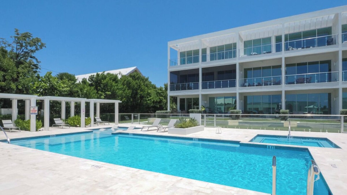 Northwest Point Condo | Bright and Chic Coastal Retreat with Ocean Views in Charming West Bay