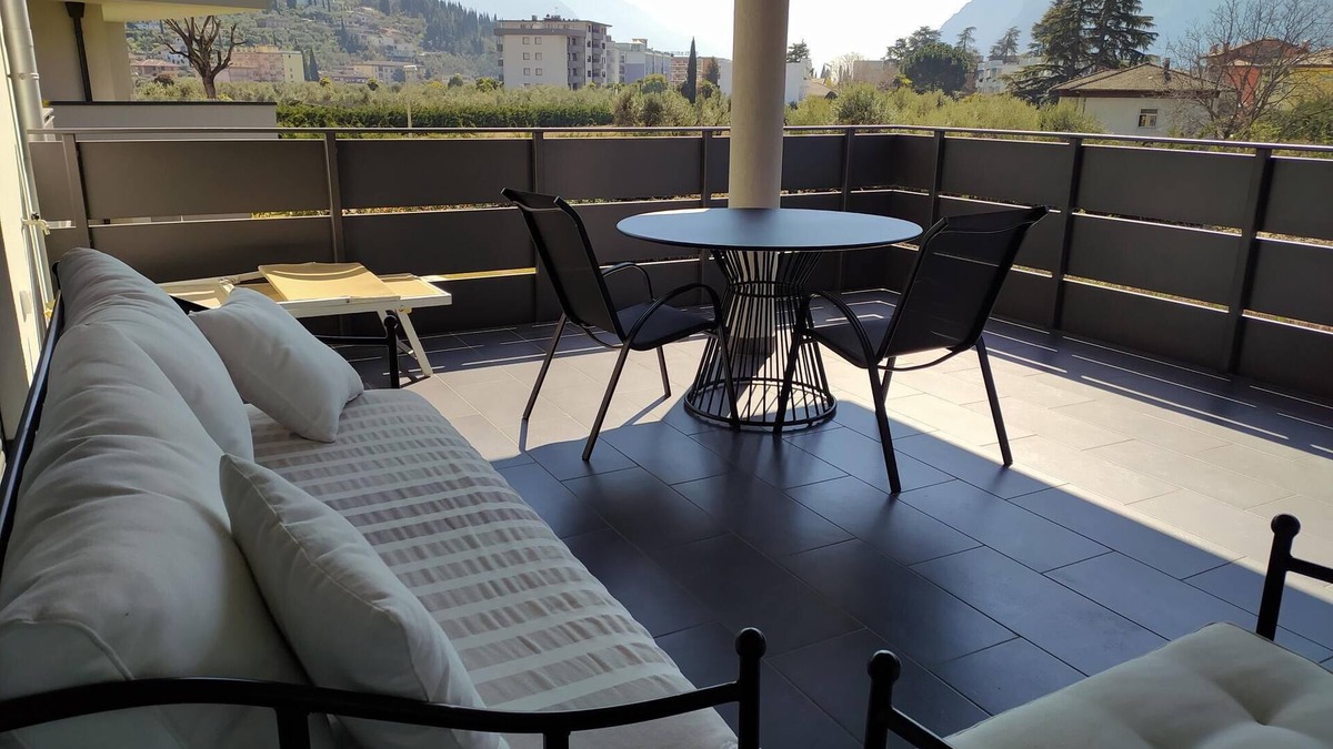 Riva del Garda Apartment | Bright apartment, near the lake, large terrace with view, a/c, garage