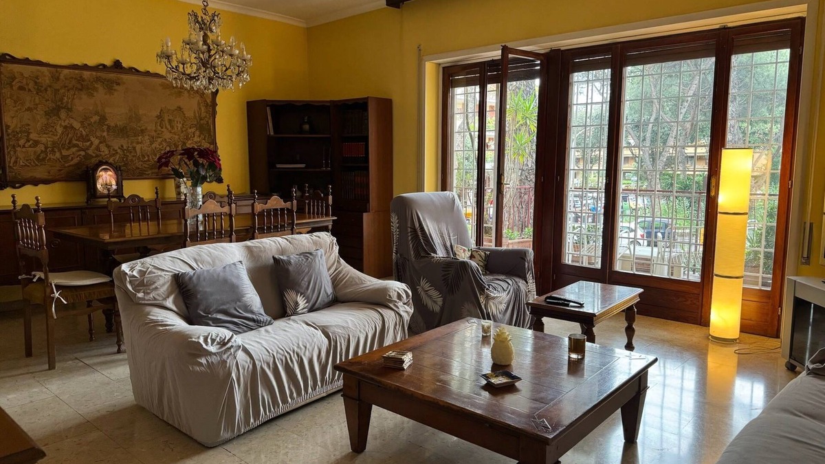 Quartiere XX Ardeatino Apartment | Bright apartment overlooking a characteristic square