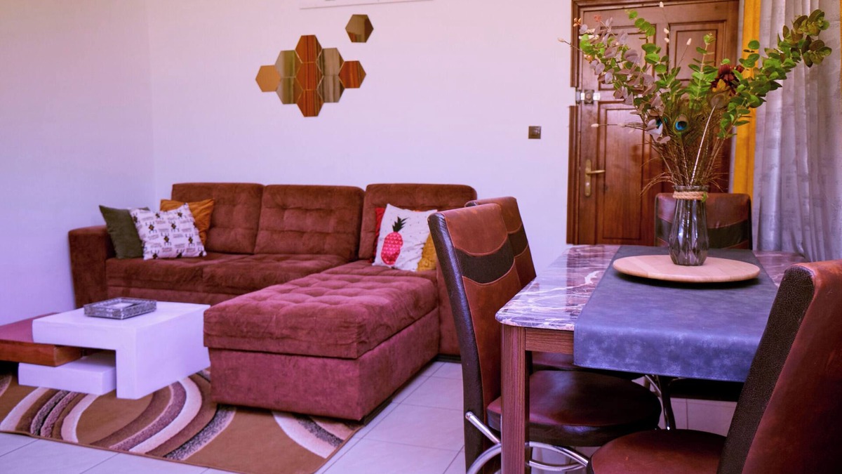 Yaounde Apartment | Bright, cozy apartment, where mustard yellow creates a warm ambience.