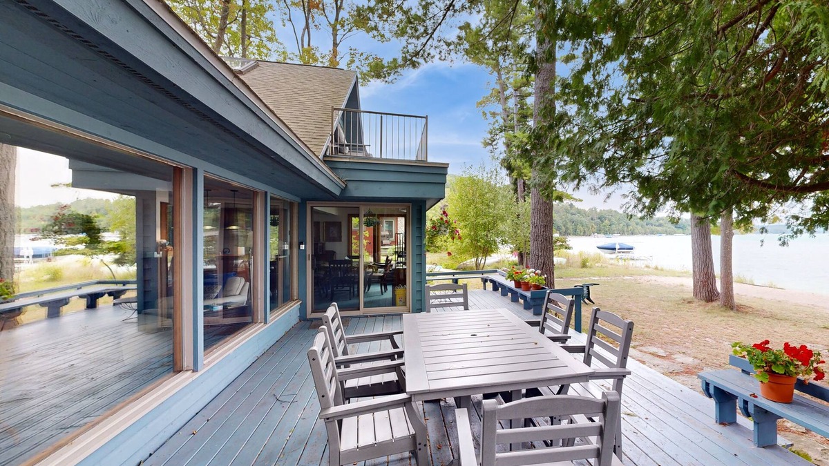 Maple City House | Bright & spacious home on Sandy Tamarack Cove with beach & dock access & firepit