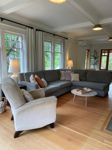 Nelson House | Bright, Spacious Home with Lake & Mountain Views, Walk to Beach