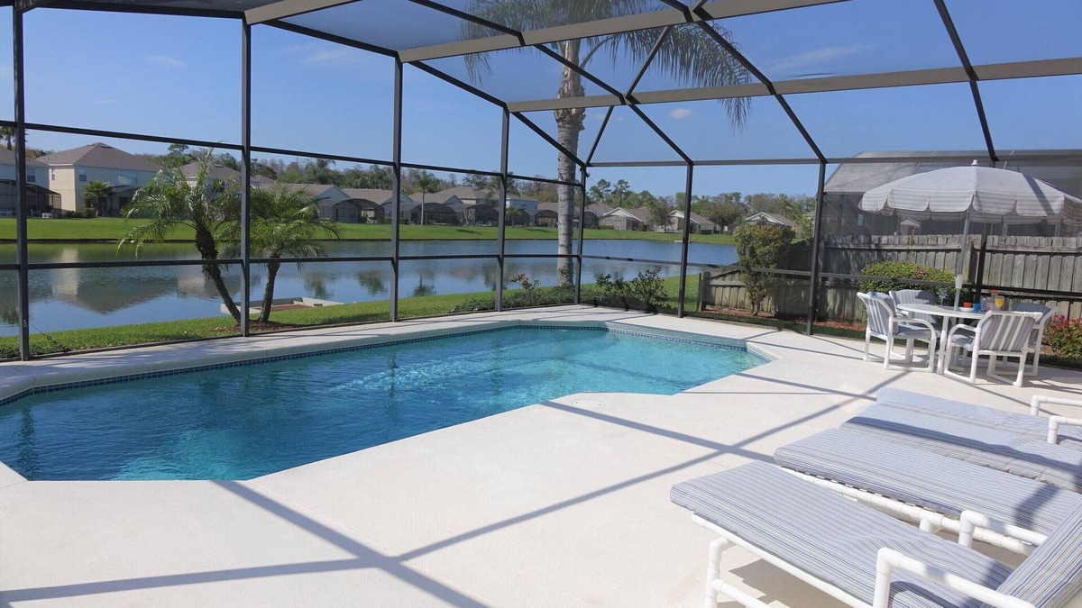 Lake Berkley Villa | BrightwaterVilla. Lake view, west facing extra large pool deck, lanai, hot tub