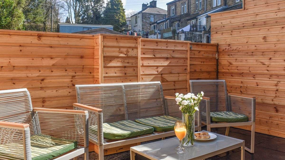 Burnley Cottage | Brun terrace offers a perfect blend of elegance and comfort.