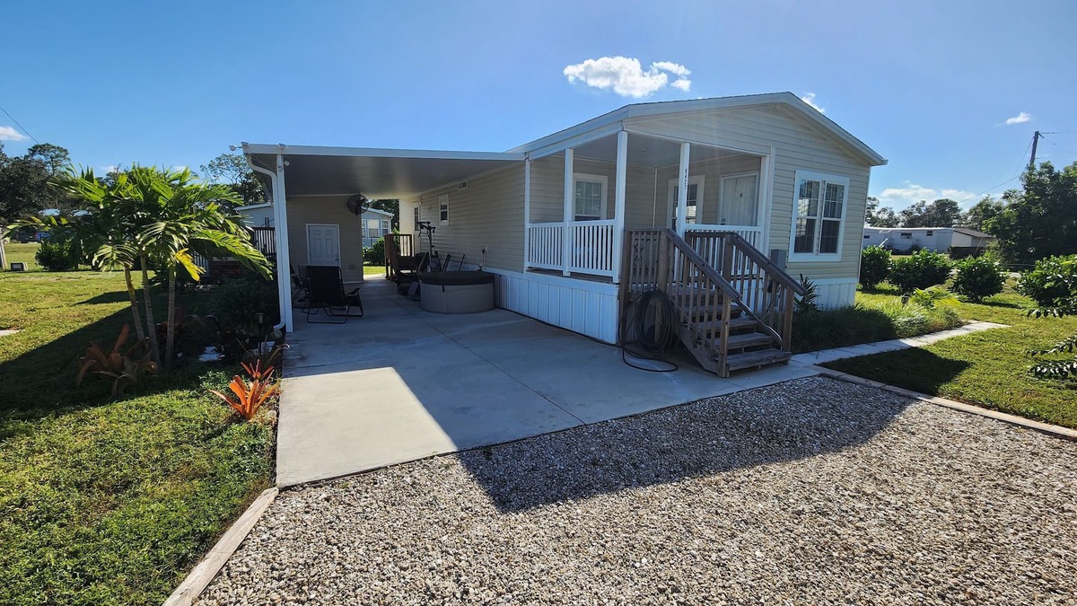 Suncoast Estates House | Buddy Ebson w/EV charger II