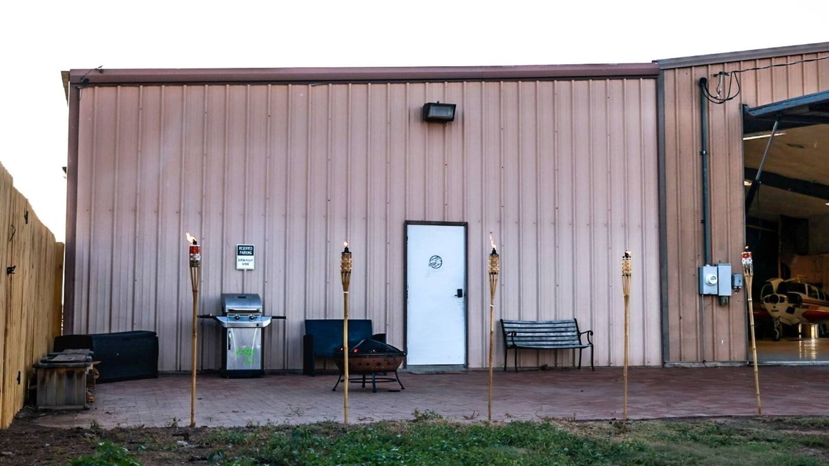 Amarillo House | Buffalo airport Fly Inn. 2 bedroom inside a airplane hangar!